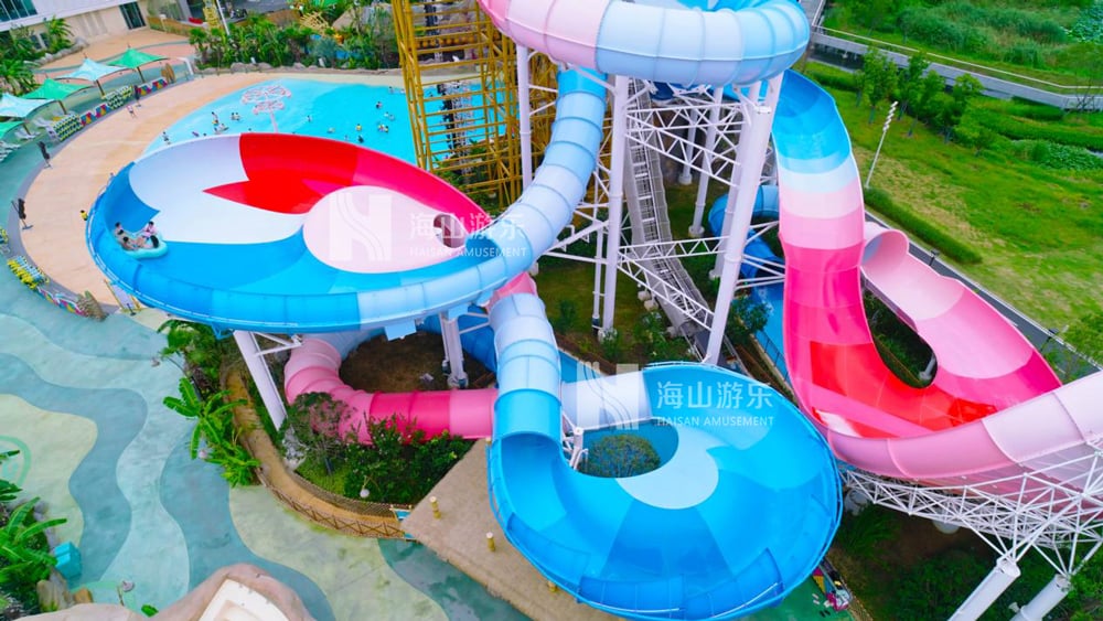 双重风暴，极致竞速——星际盘旋+巨浪翻滚组合引爆水乐园刺激体验